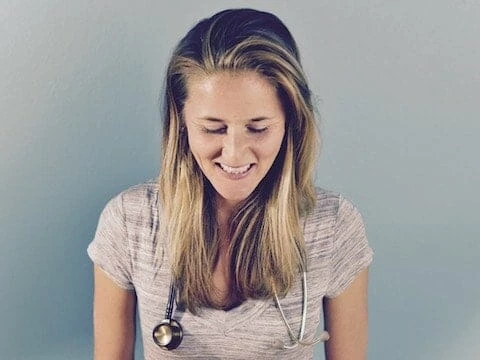 A smiling national nurse coach.